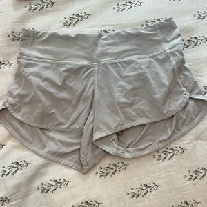 White speed up low rise lines lululemon shorts. 2.5 inch